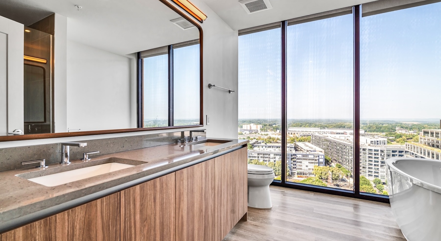 open bathroom with large windows