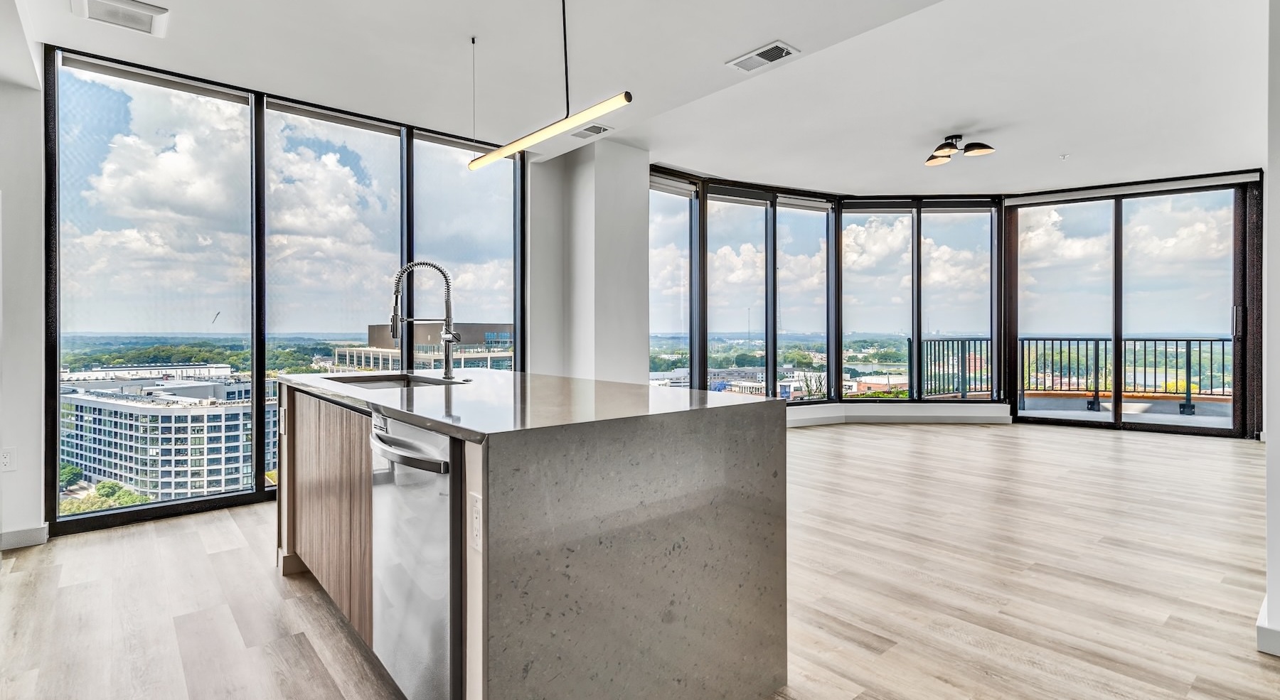 kitchen and living room with large windows