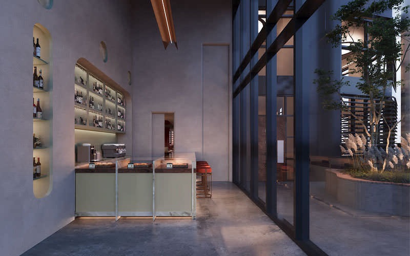 coffee shop with bottles of wine on shelves